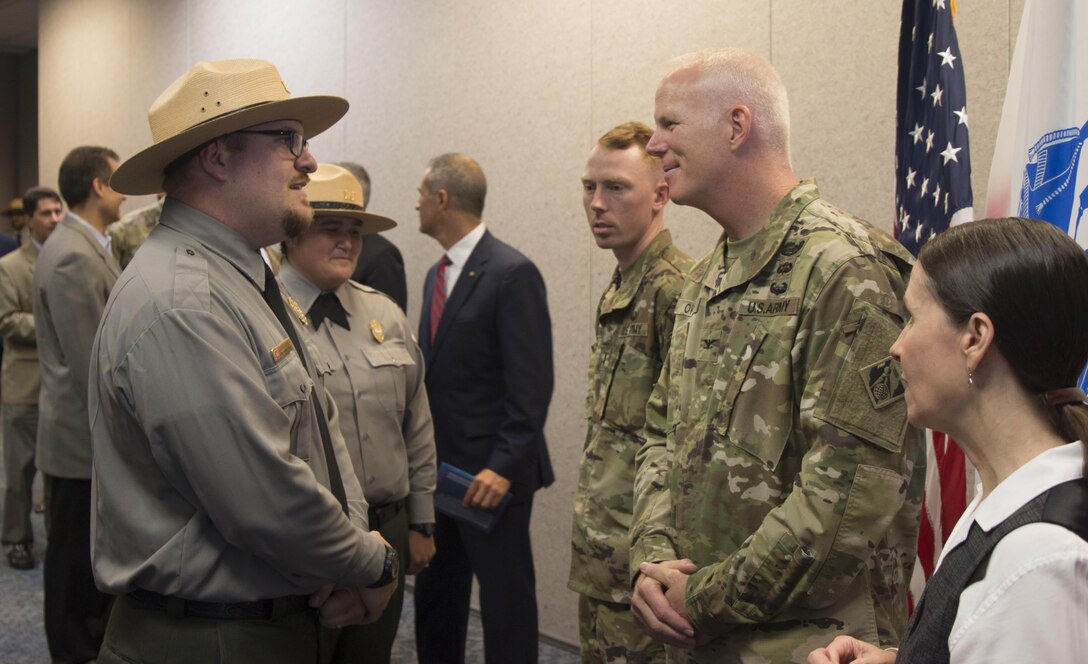 Col. Paul E. Owen took command of the Southwestern Division today in a ceremony officiated by Lt. Gen. Todd T. Semonite, Chief of Engineers and Commanding General of the U.S. Army Corps of Engineers.

Owen speaks with Fort Worth District Rangers in a receiving line following today’s change of command ceremony.