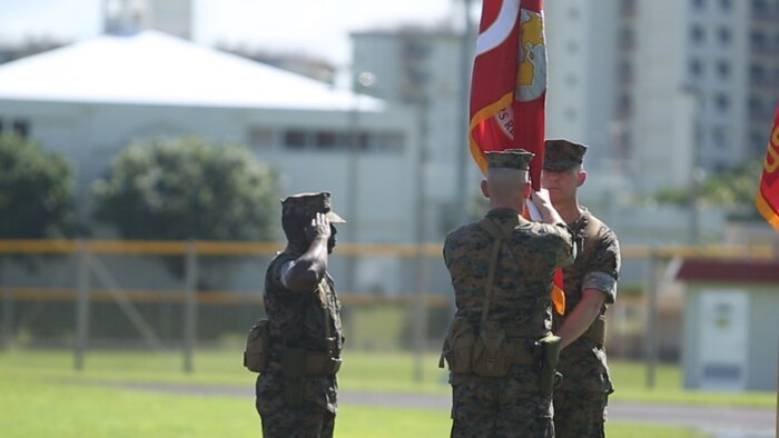 Col. Christopher A. Feyedelem passes the regimental colors at the 3rd Marine Logistics Group Headquarters Regiment change of command ceremony, June 28, 2017, on Camp Kinser, Okinawa, Japan. Since July 2015, Feyedelem, a Norwalk, Ohio native, has served as the regimental commanding officer as well as the camp commander for Camp Kinser. His responsibilities not only entailed taking care of his Marines, but also developing relationships and working closely with the local community of Urasoe City. He will next be serving as the Chief of Staff for Marine Corps Logistics Command in Albany, Georgia. (U.S. Marine Corps video by Sgt. Kathy Nunez)