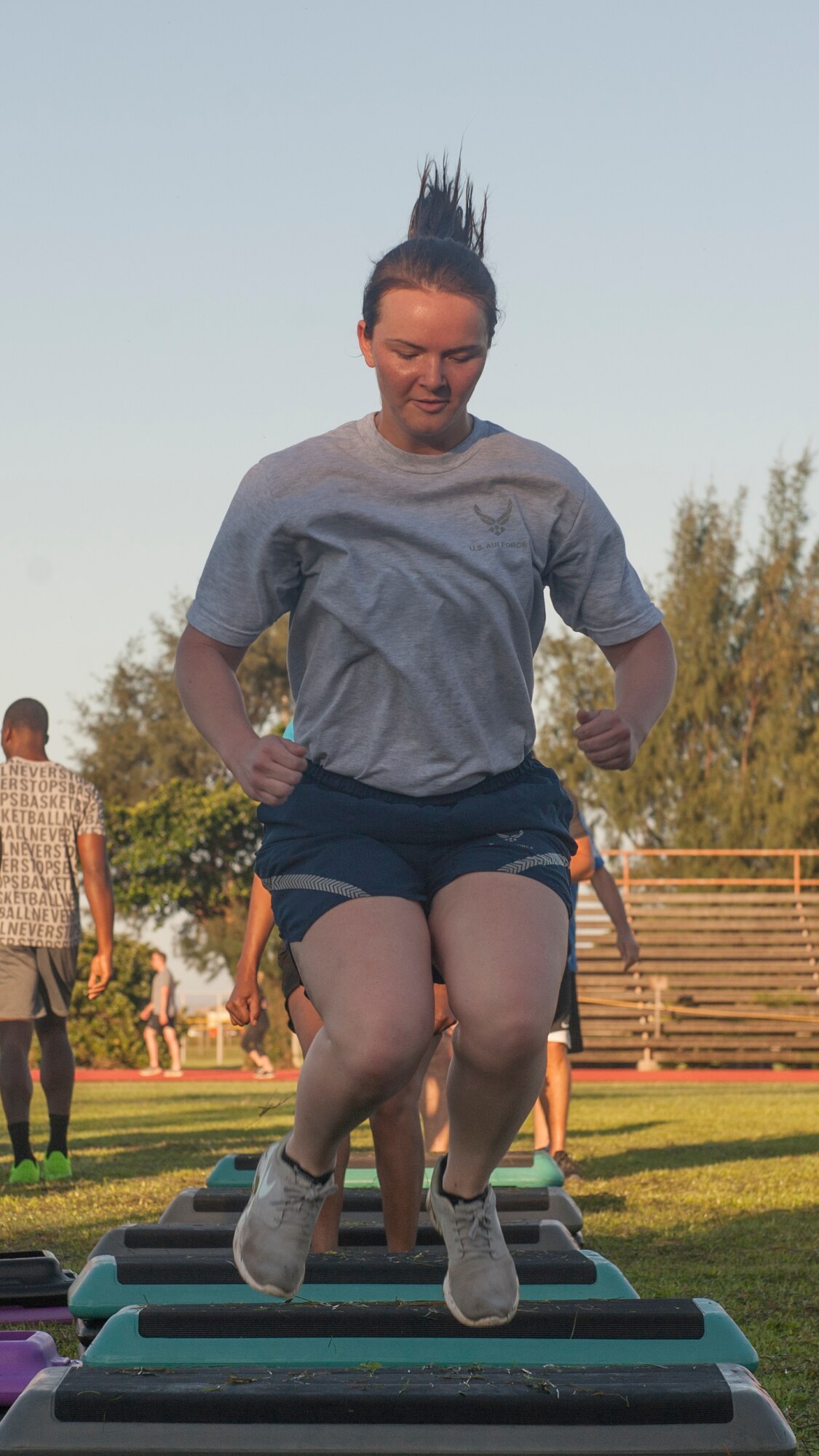 U.S. Air Force Airman 1st Class Samantha Park, 18th Security Forces Squadron defender, jumps through a plank exercise station at a Warrior Training Fitness workout June 28, 2017, at the Risner Fitness and Sports Complex, Kadena Air Base, Japan. Warrior Training Fitness workouts occur every second and fourth Wednesday of each month. (U.S. Air Force photo/Airman 1st Class Greg Erwin)