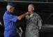 U.S. Air Force Lt. Col. Christopher Tooman, 8th Aircraft Maintenance Squadron commander, speaks with retired Buck Sgt. Richard Morse, Korean War veteran and former security forces patrolman, June 30, 2017, during a tour at Kunsan Air Base, Republic of Korea. Members of the Korean War Veterans Association, which is comprised of veterans and their families, visited the major landmarks on the installation while meeting Wolf Pack Airmen. (U.S. Air Force photo by Staff Sgt. Victoria H. Taylor/Released)