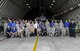 U.S. Air Force Airmen assigned to the 8th Aircraft Maintenance Squadron and Korean War veterans and their families pose for a photo June 30, 2017, during a tour at Kunsan Air Base, Republic of Korea. Members of the Korean War Veterans Association, which is comprised of veterans and their families, received the tour as a sign of thanks for the sacrifices they endured in order to make the Wolf Pack what it is today. (U.S. Air Force photo by Staff Sgt. Victoria H. Taylor/Released) (U.S. Air Force photo by Staff Sgt. Victoria H. Taylor/Released)
