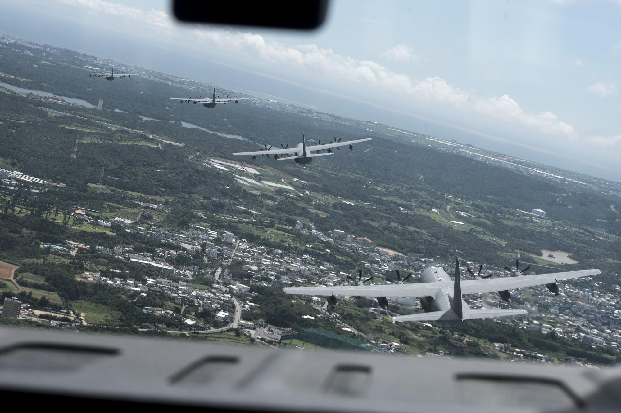 U.S. Air Force MC-130J Commando IIs from the 17th Special Operations Squadron line up in a five-aircraft formation June 22, 2017 off the coast of Okinawa, Japan, during a mass launch training mission. The MC-130J Commando II is a multi-mission combat transport/special operations tanker capable of delivering a payload of 42,000 pounds. (U.S. Air Force photo by Senior Airman John Linzmeier)