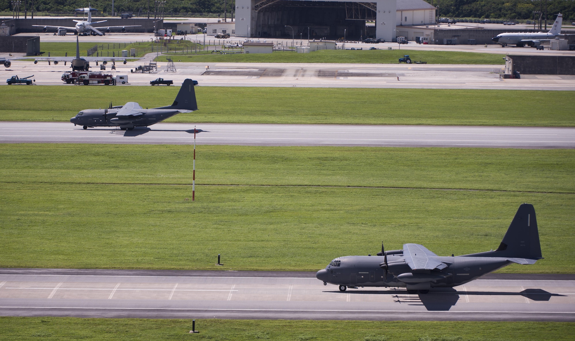 U.S. Air Force MC-130J Commando IIs from the 17th Special Operations Squadron conduct dual runway minimal interval landings June 22, 2017 at Kadena Air Base, Japan. Routine flights and airdrops are conducted to maintain proficiency and training certifications for prospective missions. (U.S. Air Force photo by Senior Airman Omari Bernard)