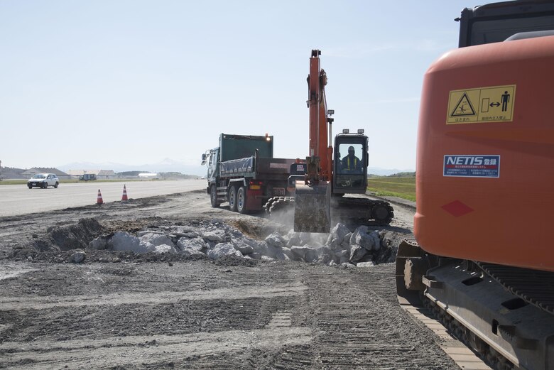 Japanese contractors conduct routine maintenance on the airfield at Misawa Air Base, Japan, May 18, 2017. The runway become fully operational June 26, more than a week ahead of schedule. This gave the 13th and 14th Fighter Squadrons along with 35th Maintenance Group personnel the opportunity to return home to their friends and family early, while also displaying their abilities to move entire squadrons across the Pacific with little notice.  (U.S. Air Force photo by Staff Sgt. Melanie Hutto)