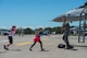 U.S Air Force Lt. Col. Christopher Moeller, 13th Fighter Squadron commander, children run to greet him after returning home from a temporary duty location at Misawa Air Base, Japan, June 26, 2017. Moeller and his team of 13th FS pilots returned from Kunsan Air Base, Republic of Korea, to a newly refurbished airfield executed by the 35th Civil Engineer Squadron and their host nation counterparts. (U.S. Air Force photo by Senior Airman Deana Heitzman)