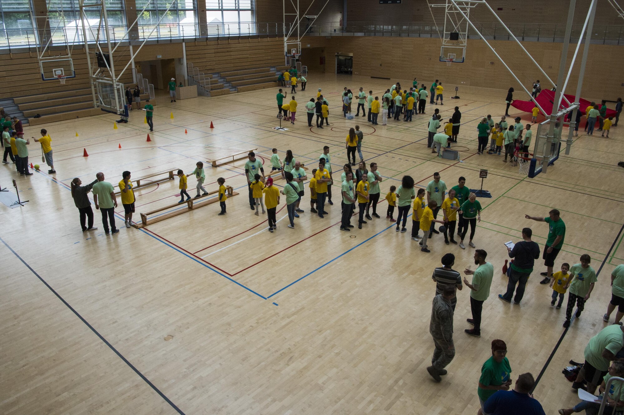Students and volunteers participate in activities during St. Martins Special Children's Day at Spangdahlem Air Base, Germany, June 28, 2017. The event marked the 25th year where students with special needs around the area were invited to participate in activities with volunteers.  (U.S. Air Force photo by Senior Airman Preston Cherry)