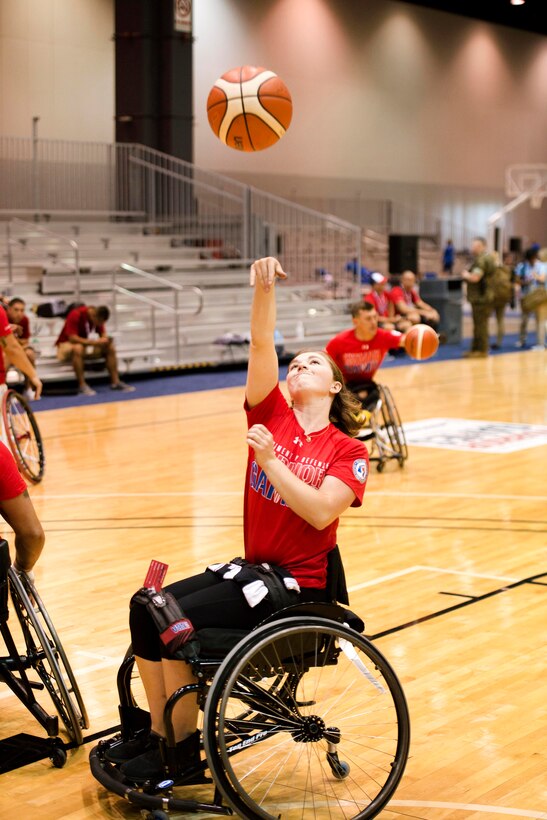 Marine Corps Cpl. Rachel Wakefield shoots the ball during wheelchair basketball practice for the 2017 Department of Defense Warrior Games in Chicago, June 29, 2017. DoD photo by EJ Hersom