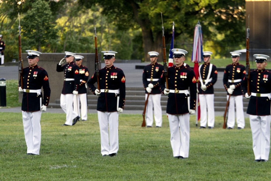 Members of the Silent Drill Platoon perform as part of the Sunset Parade in Arlington, Va., June 20, 2017. Collegiate educators came to the parade as part of the week-long Officer Selection Officers’ Educators’ and Key Leaders’ Workshop. During the engagement, the attendees learned about officer programs for their students, conducted patrols, negotiated the Leadership Reaction Course and experienced several other events. The purpose of the workshop is to create mutually beneficial relationships between the educators and the Marine Corps so the collegiate leaders can share their knowledge with their students based on first-hand experiences.