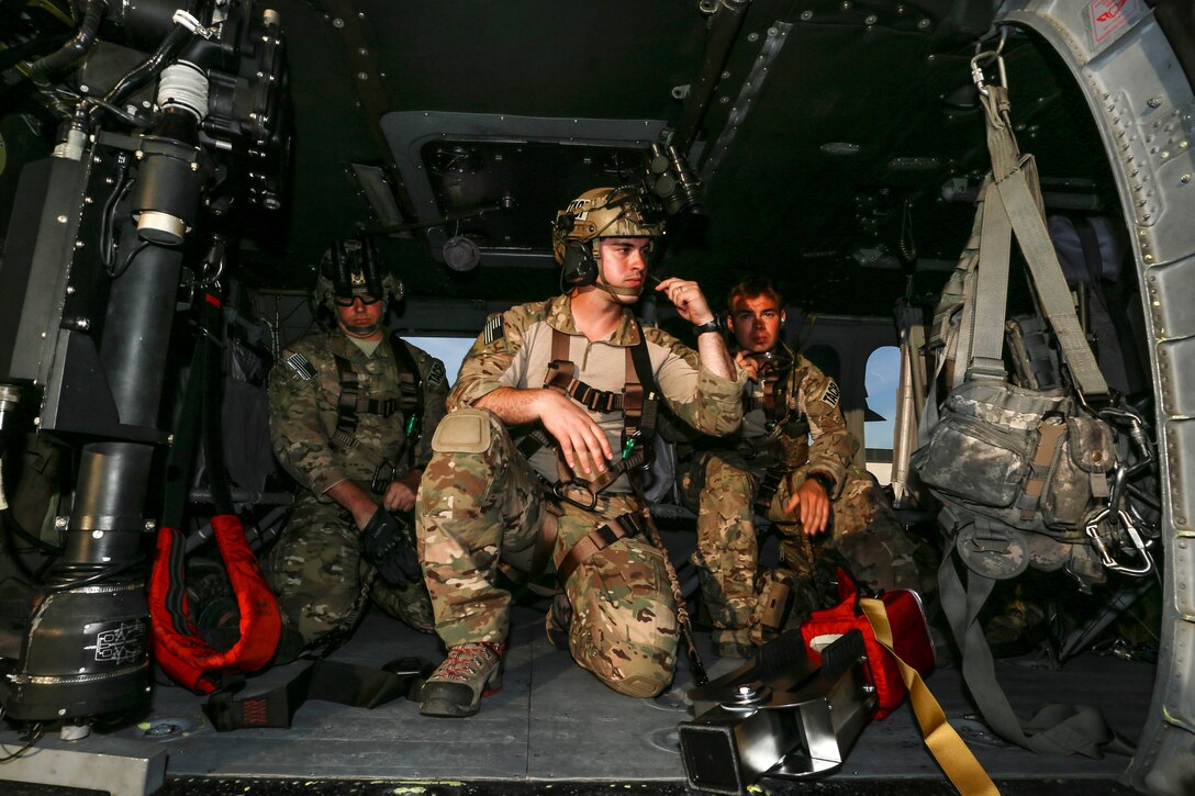 New Jersey Guardsmen prepare to liftoff in a UH-60 Black Hawk helicopter during New Jersey Task Force 1 training at Joint Base McGuire-Dix-Lakehurst, N.J., June 28, 2017. The airmen are assigned to the New Jersey Air National Guard’s 227th Air Support Operations Squadron. Air National Guard photo by Master Sgt. Matt Hecht