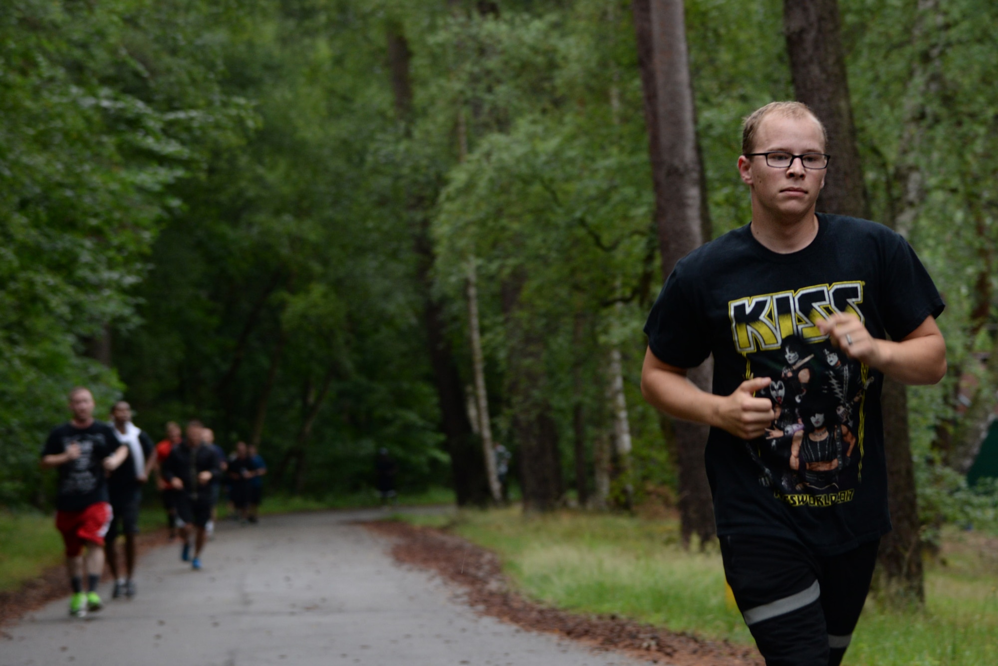U.S. Air Force Senior Airman Glenn Goldbeck, 1st Combat Communications Squadron radio frequencies transmission technician, runs during the 3rd annual 435th Air Ground Operations Wing’s 10-miler outside the 435th Construction and Training Squadron on Ramstein Air Base, Germany, June 28, 2017 . More than 200 people came out to participate in the event. (U.S. Air Force photo by Airman 1st Class D. Blake Browning)
