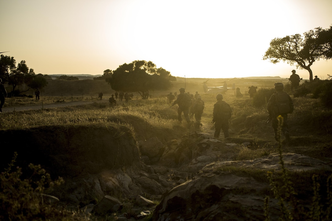 Marines assigned to Special Purpose Marine Air-Ground Task Force-Crisis Response-Africa prepare to load a MV-22B Osprey aircraft at Sierra Del Retan, Spain, June 26, 2017. SPMAGTF-CR-AF deployed to conduct limited crisis response and theater security operations in Europe and North Africa. 