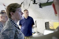 Air Force Gen. Lori J. Robinson (Right) tours the capabilities of Joint Task Force Civil Support (JTF-CS), April 26, 2017, Fort Eustis VA. JTF-CS anticipates plans and integrates U.S. Northern Command chemical, biological, radiological and nuclear operations. Robinson is the commander of North American Aerospace Defense Command (NORAD) and United States Northern Command (USNORTHCOM). JTF-CS provides command and control for designated Department of Defense specialized response forces to assist local, state, federal and tribal partners in saving lives, preventing further injury, and providing critical support to enable community recovery. (Official DOD Photo MC2 Benjamin Liston/RELEASED)