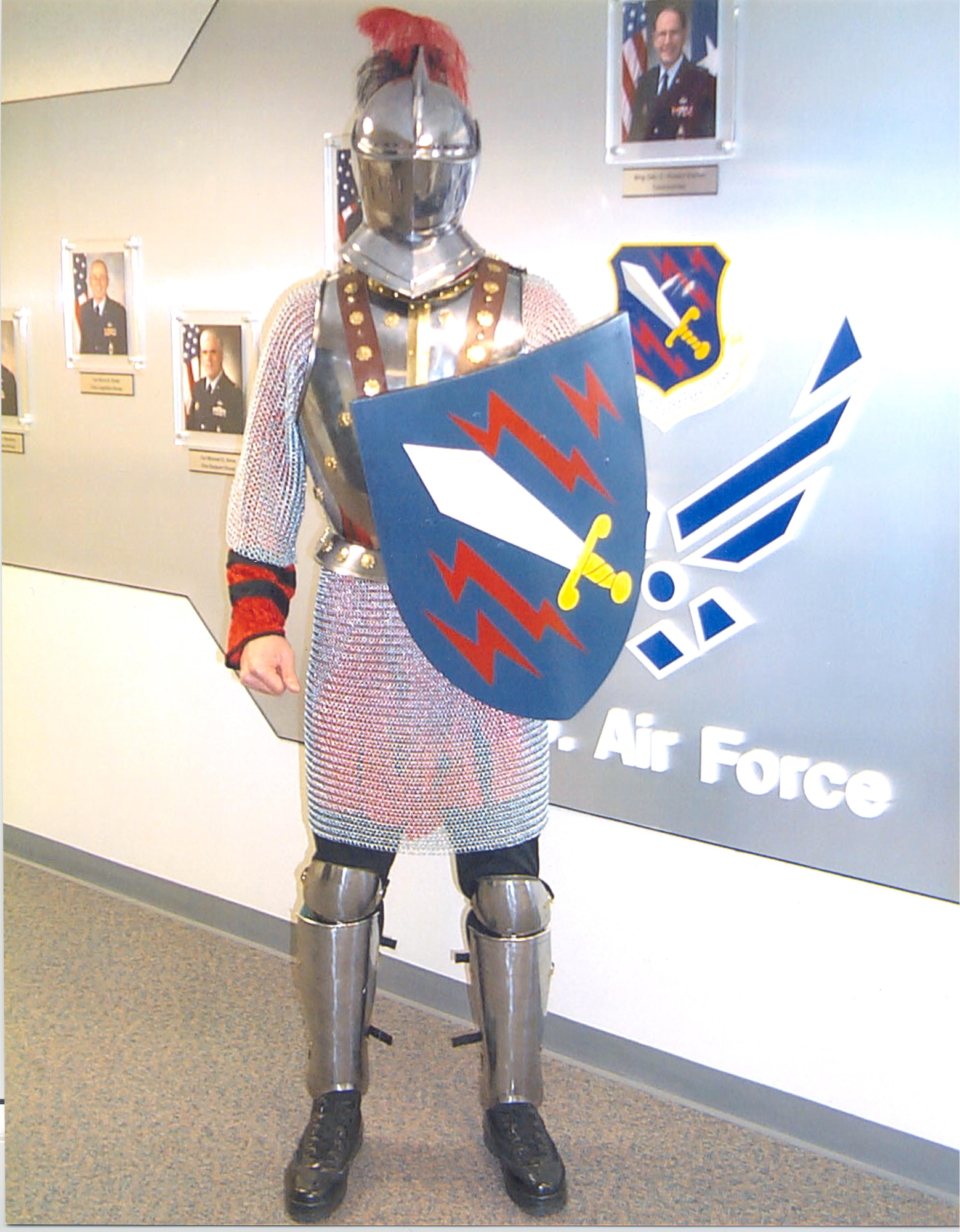 PETERSON AIR FORCE BASE, Colo. - The 21st Operations Group raises funds to upgrade Iron Mike, especially the armor, for Iron Mike’s third costume in 2002.  Dr. David Bullock, 21st Space Wing History Office chief, created Iron Mike in 1996 to represent the 21st SW during a Guardian Challenge competition. (Courtesy photo)