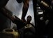 Airman 1st Class William Woodside, 786th Civil Engineer Squadron electrical power production apprentice, drains coolant out of a generator system on Ramstein Air Base, Germany, June 27, 2017. The preventative maintenance provided fresh fluids to prevent the system from malfunctioning during a real-world power outage and mitigates mission stoppage due to loss of commercial power. (U.S. Air Force photo by Airman 1st Class Savannah L. Waters)