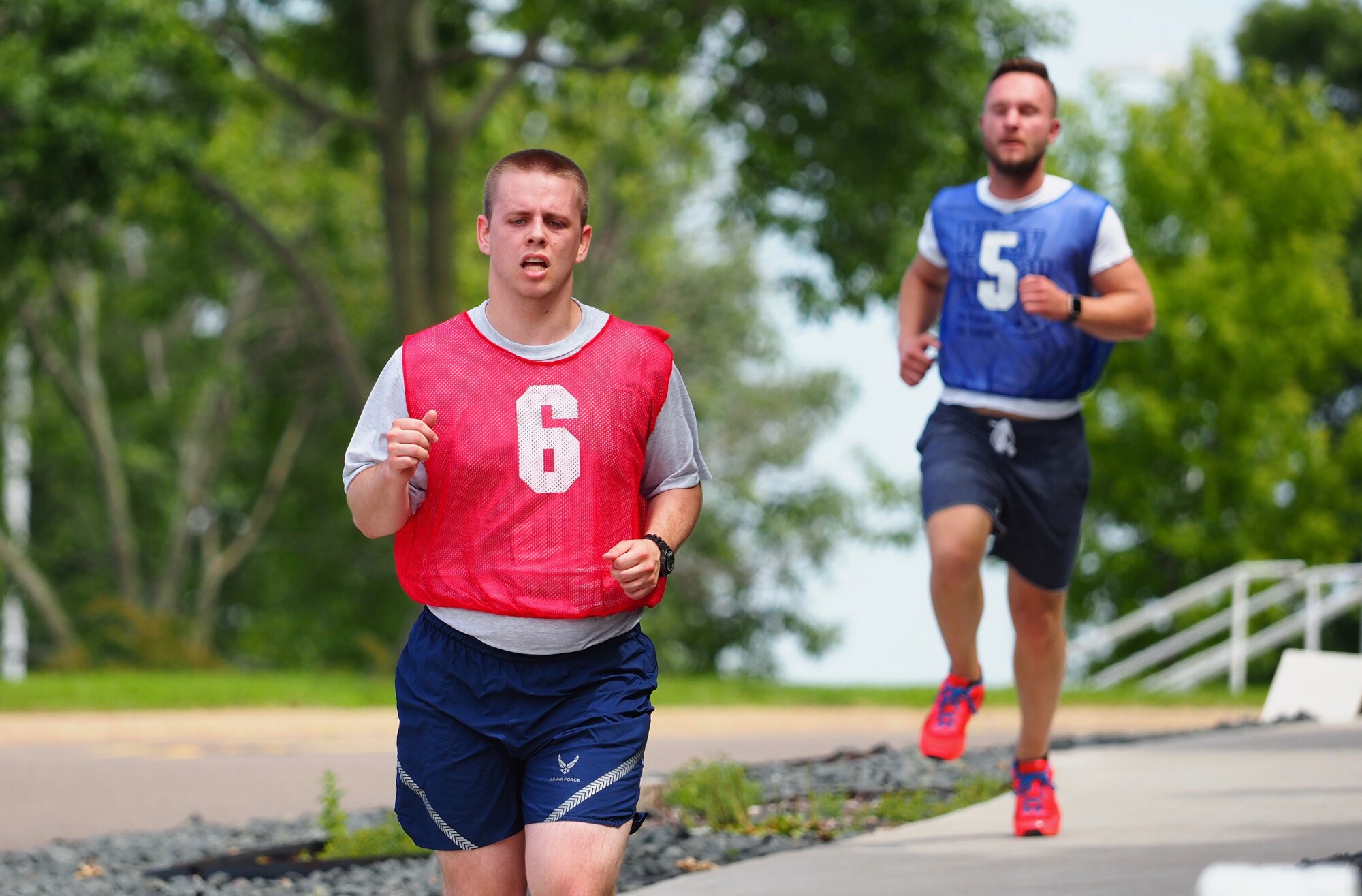 Ecolab employees and 934 AW members complete the run portion of the fitness test. (Air Force Photo/Paul Zadach)