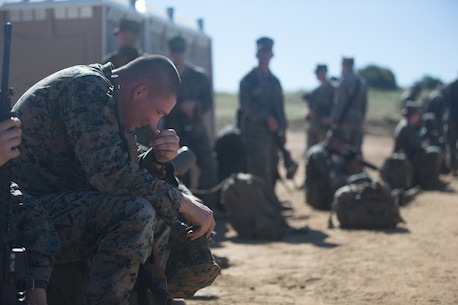 U.S. Marine Lance Cpl. Scott Patterson, an electronic maintainer with Combat Logistics Battalion 5, Headquarters Regiment, 1st Marine Logistics Group, pauses during a seven mile conditioning hike on Camp Pendleton, Calif., June 27, 2017. The Marines have multiple conditioning hikes to prepare for Mountain Exercise 4-17 which will be conducted at the Marine Corps Mountain Warfare Training Center in Bridgeport, Calif. (U.S. Marine Corps photo by Lance Cpl. Timothy Shoemaker)