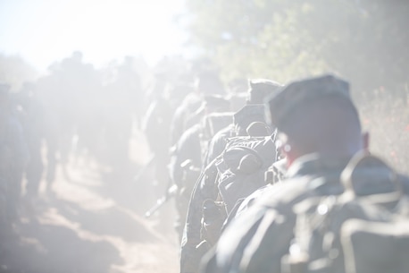 U.S. Marines and Sailors with Combat Logistics Battalion 5, Combat Logistics Regiment 1, 1st Marine Logistics Group participate in a seven mile conditioning hike on Camp Pendleton, Calif., June 27, 2017. The Marines have multiple conditioning hikes to prepare for Mountain Exercise 4-17 which will be conducted at the Marine Corps Mountain Warfare Training Center in Bridgeport, Calif. (U.S. Marine Corps photo by Lance Cpl. Timothy Shoemaker)