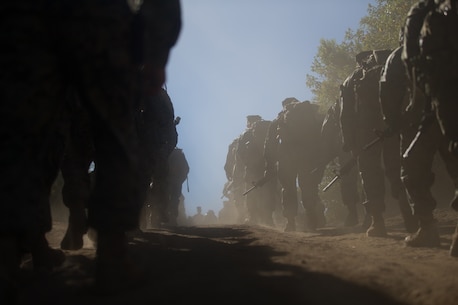 U.S. Marines and Sailors with Combat Logistics Battalion 5, Combat Logistics Regiment 1, 1st Marine Logistics Group participate in a seven mile conditioning hike on Camp Pendleton, Calif., June 27, 2017. The Marines have multiple conditioning hikes to prepare for Mountain Exercise 4-17 which will be conducted at the Marine Corps Mountain Warfare Training Center in Bridgeport, Calif. (U.S. Marine Corps photo by Lance Cpl. Timothy Shoemaker)