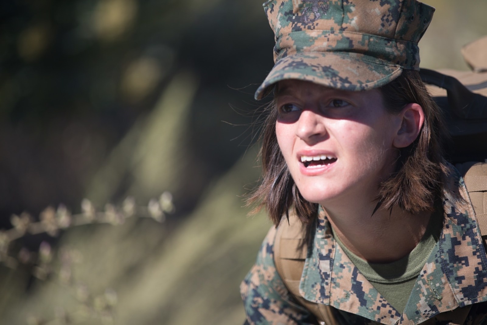 U.S. Marine Pfc. Catherine Mason, an electrician with Combat Logistics Battalion 5, Headquarters Regiment, 1st Marine Logistics Group, participates in a conditioning hike on Camp Pendleton, Calif., June 27, 2017. The Marines have multiple conditioning hikes to prepare for Mountain Exercise 4-17 which will be conducted at the Marine Corps Mountain Warfare Training Center in Bridgeport, Calif. (U.S. Marine Corps photo by Lance Cpl. Timothy Shoemaker)