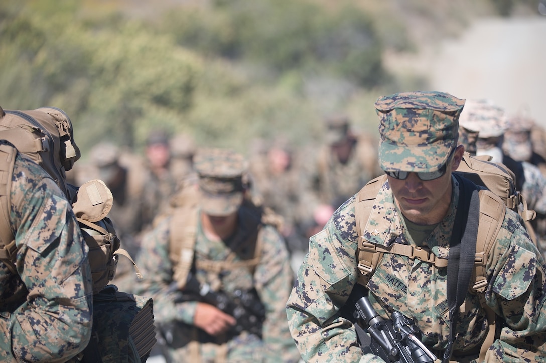 U.S. Marines and Sailors with Combat Logistics Battalion 5, Combat Logistics Regiment 1, 1st Marine Logistics Group participate in a conditioning hike on Camp Pendleton, Calif., June 27, 2017. The Marines have multiple conditioning hikes to prepare for Mountain Exercise 4-17 which will be conducted at the Marine Corps Mountain Warfare Training Center in Bridgeport, Calif. (U.S. Marine Corps photo by Lance Cpl. Timothy Shoemaker)