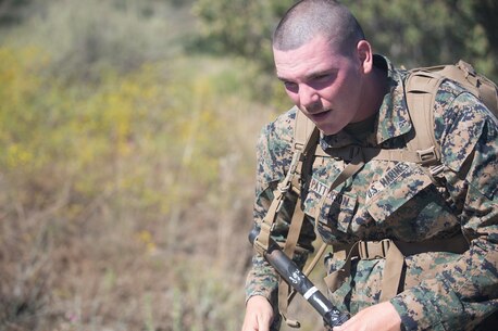 U.S. Marine Lance Cpl. Scott Patterson, an electronics maintainer with Combat Logistics Battalion 5, Headquarters Regiment, 1st Marine Logistics Group participates in a conditioning hike on Camp Pendleton, Calif., June 27, 2017. The Marines have multiple conditioning hikes to prepare for Mountain Exercise 4-17 which will be conducted at the Marine Corps Mountain Warfare Training Center in Bridgeport, Calif. (U.S. Marine Corps photo by Lance Cpl. Timothy Shoemaker)