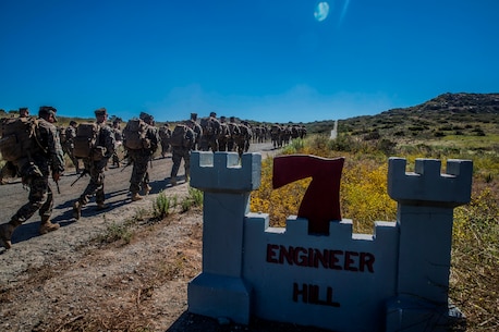 U.S. Marines and Sailors with Combat Logistics Battalion 5, Combat Logistics Regiment 1, 1st Marine Logistics Group participate in a seven mile conditioning hike on Camp Pendleton, Calif., June 27, 2017. The Marines have multiple conditioning hikes to prepare for Mountain Exercise 4-17 which will be conducted at the Marine Corps Mountain Warfare Training Center in Bridgeport, Calif. (U.S. Marine Corps photo by Lance Cpl. Adam Dublinske)