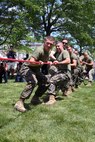 Marines compete in tug-of-war during Sail Boston 2017 at Marine Park in Boston, Mass., June 21, 2017. The event was one of many during Sail Boston that brought together Marines, Sailors and the community to foster high spirits and a team mentality. Some of the many physical events that took place during Sail Boston included tug-of-war, a soccer tournament, and a patriot run. (U.S. Marine Corps photo by Cpl. Mackenzie Gibson/Released) 