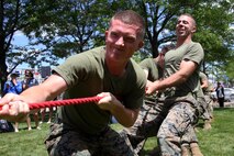 Marines compete in tug-of-war during Sail Boston 2017 at Marine Park in Boston, Mass., June 21, 2017. The event was one of many during Sail Boston that brought together Marines, Sailors and the community to foster high spirits and a team mentality. Some of the many physical events that took place during Sail Boston included tug-of-war, a soccer tournament, and a patriot run. (U.S. Marine Corps photo by Cpl. Mackenzie Gibson/Released) 