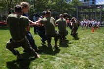 Boston 2017 at Marine Park in Boston, Mass., June 21, 2017. The event was one of many during Sail Boston that brought together Marines, Sailors and the community to foster high spirits and a team mentality. Some of the many physical events that took place during Sail Boston included tug-of-war, a soccer tournament, and a patriot run. (U.S. Marine Corps photo by Cpl. Mackenzie Gibson/Released)