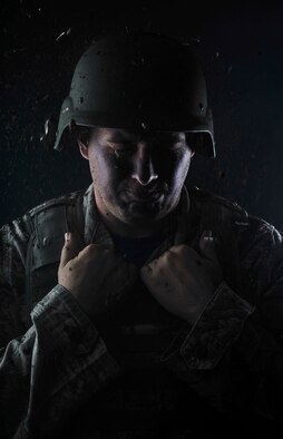 Retired U.S. Air Force Staff Sgt. Clifton Flint, formerly 48th Security Forces Squadron base defense operations center controller, poses for a photo to represent post-traumatic stress disorder June 30, 2017, on RAF Mildenhall, England. June is National PTSD Awareness Month. Flint suffers from post-traumatic stress disorder, brought on after sustaining a traumatic brain injury while deployed to Iraq in 2005. (U.S. Air Force photo by Staff Sgt. Micaiah Anthony)