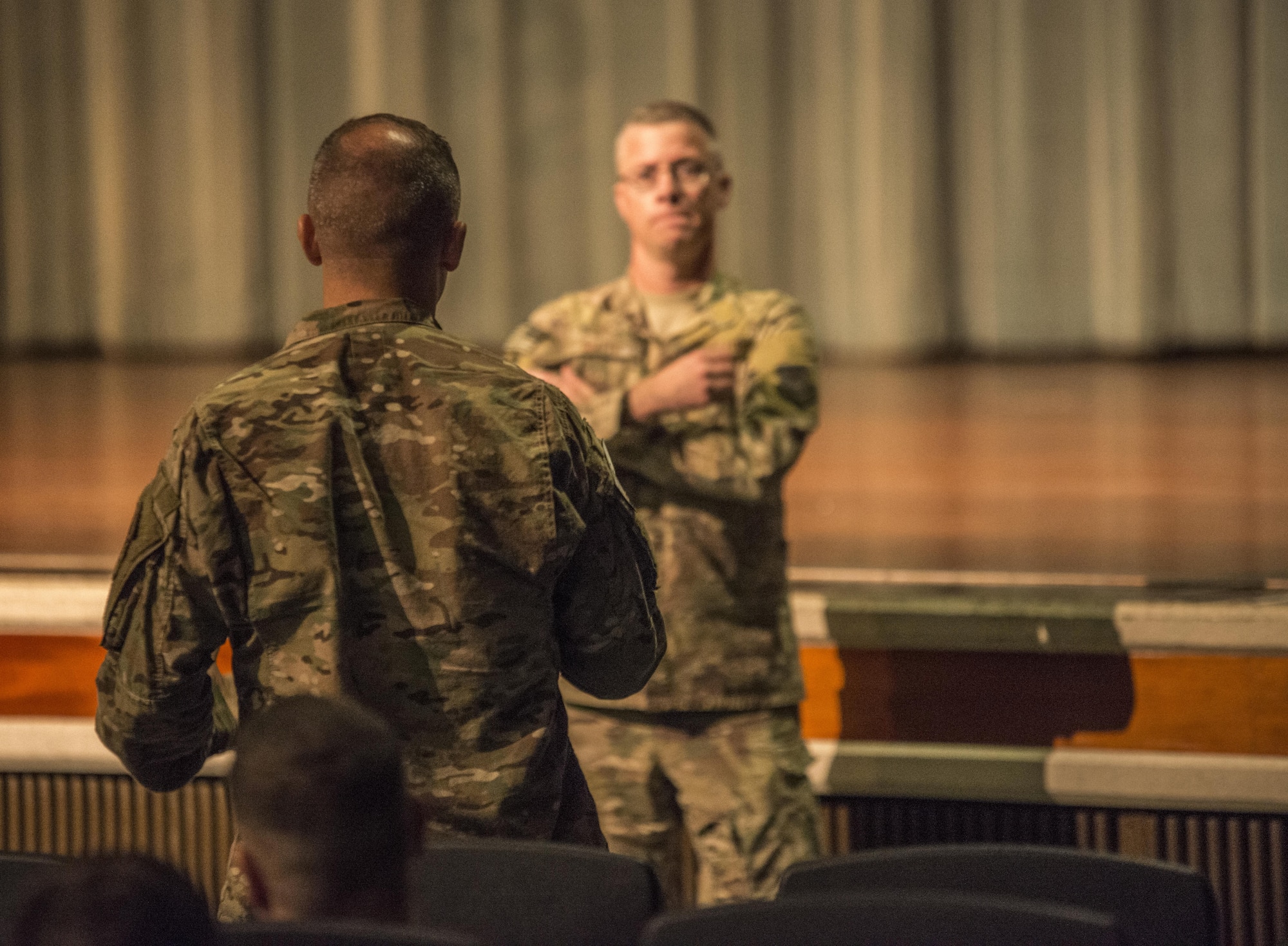 Air Force Special Operations Command Chief Master Sgt. Gregory Smith addresses the enlisted members of the 353rd Special Operations Group during an all-call June 19, 2017 at Kadena Air Base, Okinawa, Japan. Airmen were invited to ask questions at the conclusion of the all-call. (U.S. Air Force photo by Capt. Jessica Tait)
