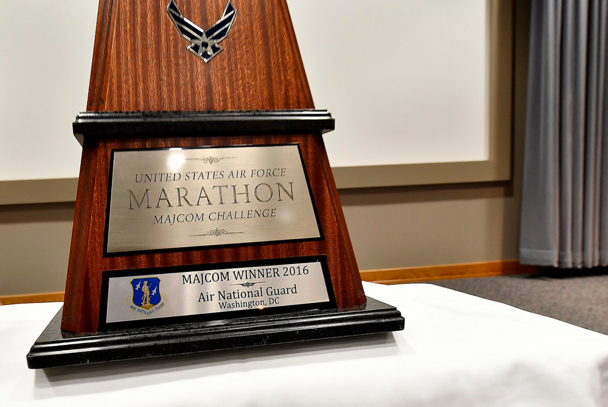 WRIGHT-PATTERSON AIR FORCE BASE, Ohio – A close-up view of the 2016 Air Force Marathon MAJCOM Challenge trophy presented to the Air National Guard team June 27, 2017, during the annual CORONA Top conference held at Headquarters Air Force Materiel Command. The presentation took place before a crowd of the Air Force’s senior leadership gathered here for a series of top-level meetings. The MAJCOM Challenge serves as a friendly service-wide competition that challenges each major command to encourage its respective Airmen to participate in the annual race. This year’s 21st annual Air Force Marathon is scheduled for Sept. 16, 2017. (U.S. Air Force photo/Scott M. Ash)
