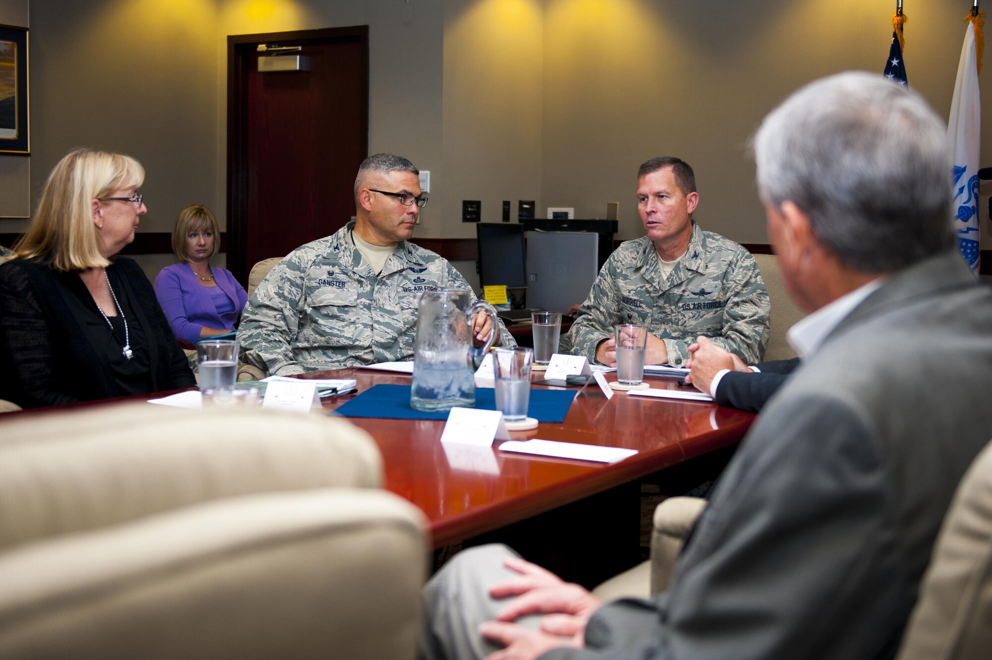 Barbara Koscak, STARBASE, Col. Alejandro Ganster, 17th Training Group Commander, and Col. Jeffery Sorrell, 17th Training Wing Vice Commander, talk during a meeting on STARBASE in the Wing Conference Room in the Norma Brown building on Goodfellow Air Force Base, Texas, June 17, 2017. The  STARBASE academies serve students that are historically under-represented in STEM.  Students who live in inner cities or rural locations, those who are socio-economically disadvantaged, low in academic performance or have a disability are in the target group. The program encourages students to set goals and achieve them. (U.S. Air Force photo by Senior Airman Scott Jackson/Released)