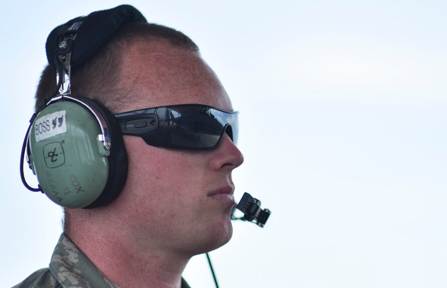 U.S. Air Force Senior Airman David Cox, 325th Aircraft Maintenance Squadron crew chief, prepares to launch an F-22 Raptor at Tyndall Air Force Base, Fla., June 26, 2017. As a crew chief, Cox is responsible for ensuring the jet is functioning properly and flight ready. (U.S. Air Force photo by Senior Airman Dustin Mullen/Released)