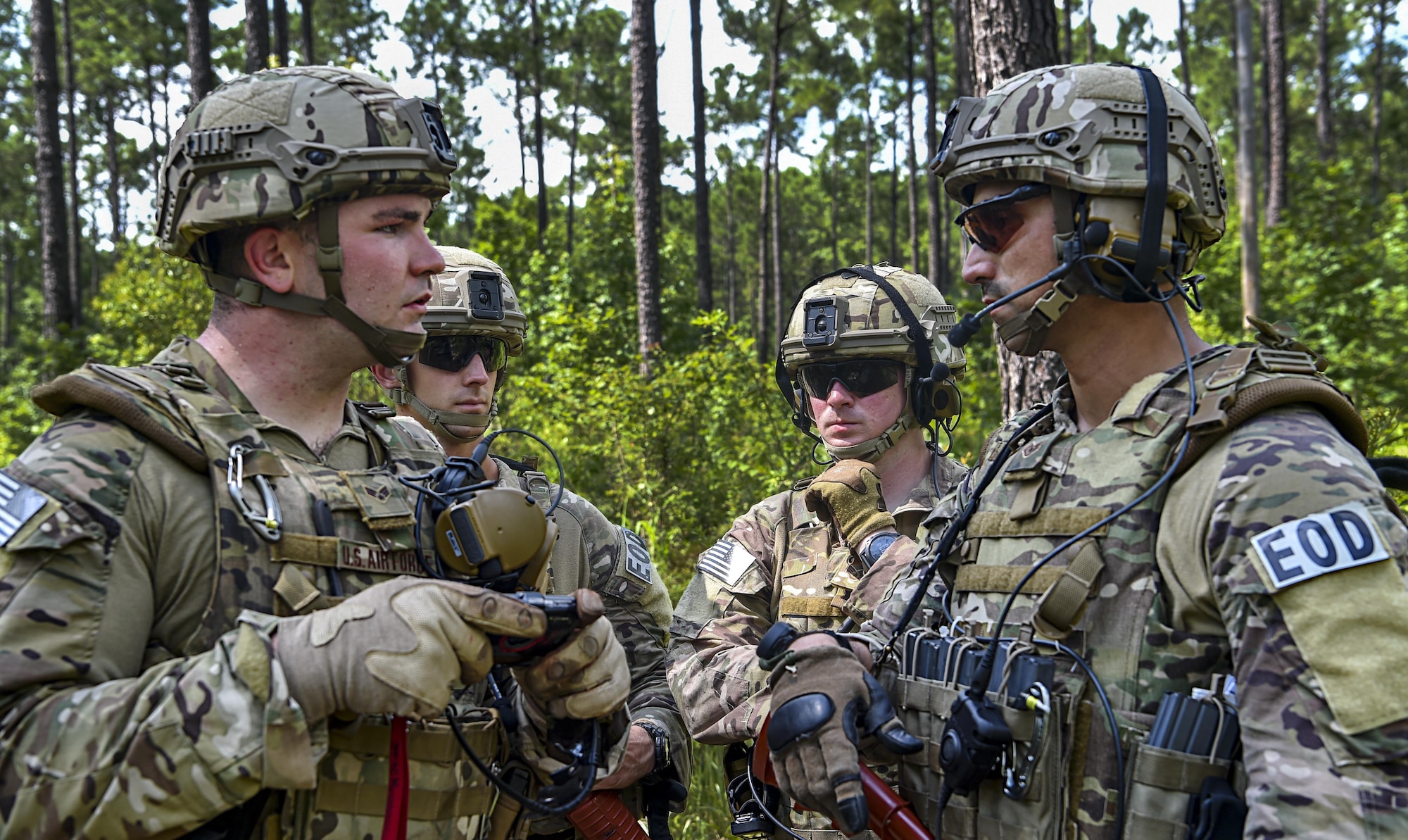 Airmen from the 628th Civil Engineer Squadron explosive ordnance disposal shop discuss a plan of action during operation Mogul Wrath, June 27, 2017. Mogul Wrath is an extensive training operation EOD here hopes to implement semi-annually. 