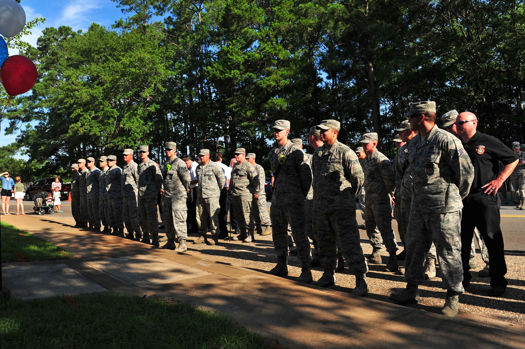 A crowd gathers before a ribbon cutting ceremony at a new 20th Civil Engineer Squadron fire station Shaw Air Force Base, S.C., June 29, 2017. The ceremony marked the opening of a new fire station in the base housing area, which enables firefighters to respond within the Department of Defense mandated response time when reacting to emergencies in the housing area. (U.S. Air Force photo by Airman 1st Class Kathryn R.C. Reaves)