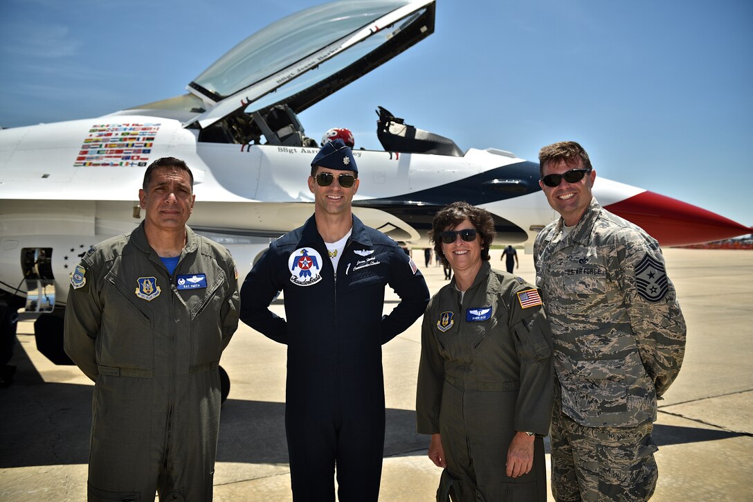 Commander of the 932nd Operations Group, Col. Ray Smith at left, stands with United States Air Force F-16 Thunderbird's leader and commander Lt. Col. Jason Heard, and 932nd Aeromedical Evacuation Squadron commander Lt. Col. Dawn Rice, along with Command Chief Master Sgt. Chad Welch.  They met after an enlistment for a new 932nd Airlift Wing recruit, who said the oath with the outstanding Thunderbirds as witnesses on June 10, 2017, Scott Air Force Base, Illinois.  (U.S. Air Force photo by Tech. Sgt. Christopher Parr)