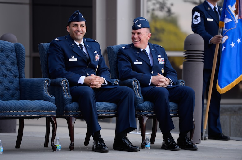 Col. Jason Janaros, outgoing 50th Mission Support Group commander, and Col. Brian Kehl, incoming commander, share a laugh during the 50 MSG change of command ceremony at Schriever Air Force Base, Colorado, Tuesday, June 27, 2017. Kehl promised to build upon the legacy of Janaros’ leadership with the 50 MSG. (U.S. Air Force photo/Chris DeWitt)