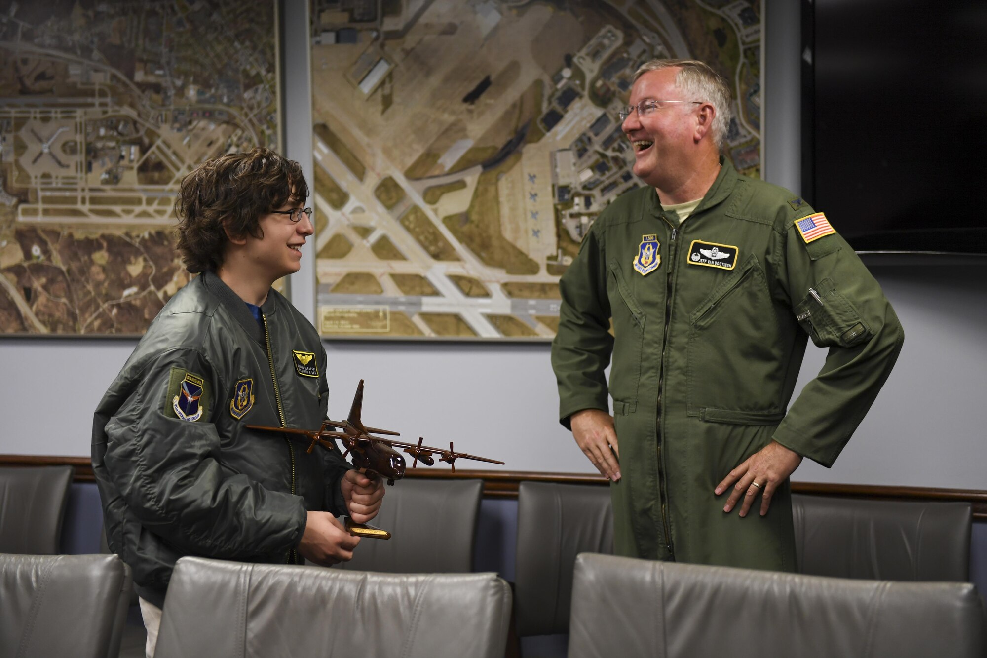 Samuel Olsavsky, pilot for a day with the Pittsburgh International Airport Air Reserve Station, speaks to Col. Jeff Van Dootingh, commander of the Pittsburgh IAP ARS, here June 27, 2017. Olsavsky was nominated for the Pilot for a Day program by the Allegheny Health Network after undergoing a spinal fusion surgery for scoliosis. (U.S. Air Force photo by Senior Airman Beth Kobily)