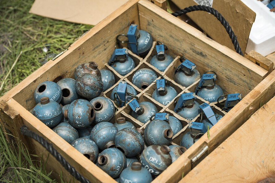 Grenades rest in a box during the Scorpion Fire Team Challenge, June 29, 2017, at Moody Air Force Base, Ga. The challenge was designed to push the Airmen to their physical and mental limits, by incorporating written tests, hostage rescues, blindfolded weapons assembly and physical exertion sessions among 14 other challenges. Eighteen four-person teams competed during the two-day event for various prizes and bragging rights. (U.S. Air Force photo by Senior Airman Janiqua P. Robinson)