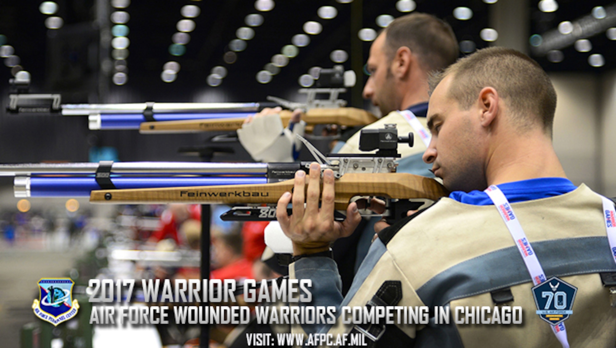 U.S. Air Force 2nd Lt. Ryan Novack [front], a munitions and missile maintenance officer from Aurora, Ill., and U.S. Air Force Reserve Tech. Sgt. Jett Blackwell [rear], a fuels technician from Bethany, Okla., take part in a practice shoot session in preparation for the 2017 Warrior Games June 29, 2017 at McCormick Place-Lakeside Center, Chicago, Ill. The Warrior Games were established in 2010 to enhance the recovery and rehabilitation process of wounded warriors, while exposing them to adaptive sports. (U.S. Air Force photo by Staff Sgt. Alexx Pons)