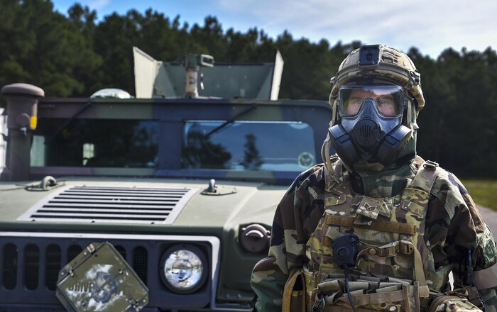 Staff Sgt. Adam Hickman, 628th Civil Engineer Squadron explosive ordnance disposal technician, waits for his team members to join him at a Humvee during a training exercise, June 28, 2017. More than 230 topics were exercised during the training operation. 