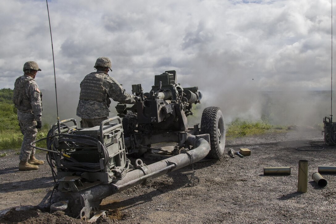 Massachusetts Army National Guards members fire an M119A3 105 mm howitzer during a live-fire exercise at Fort Drum, N.Y., June 20, 2017. Army National Guard photo by Spc. Avery Cunningham