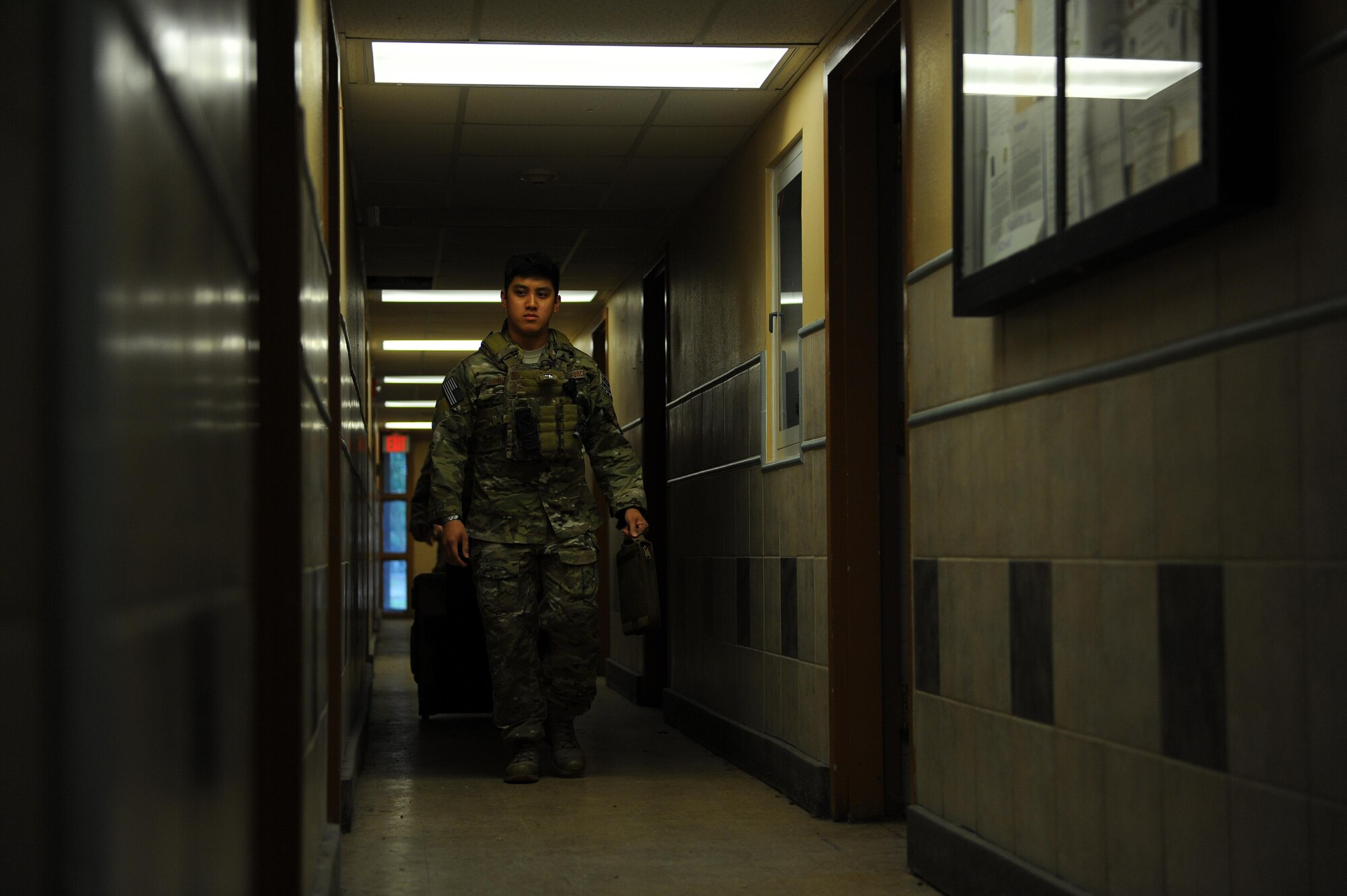 Staff Sgt. Paoloarnold Pineda, an explosive ordnance disposal craftsman with the 1st Special Operations Civil Engineering Squadron, walks toward the room where a hostage is being held during an exercise at Hurlburt Field, Fla., June 21, 2017. EOD technicians are trained to detect, disarm, detonate and dispose of explosive threats as safely as possible. (U.S. Air Force photo by Airman 1st Class Isaac O. Guest IV)