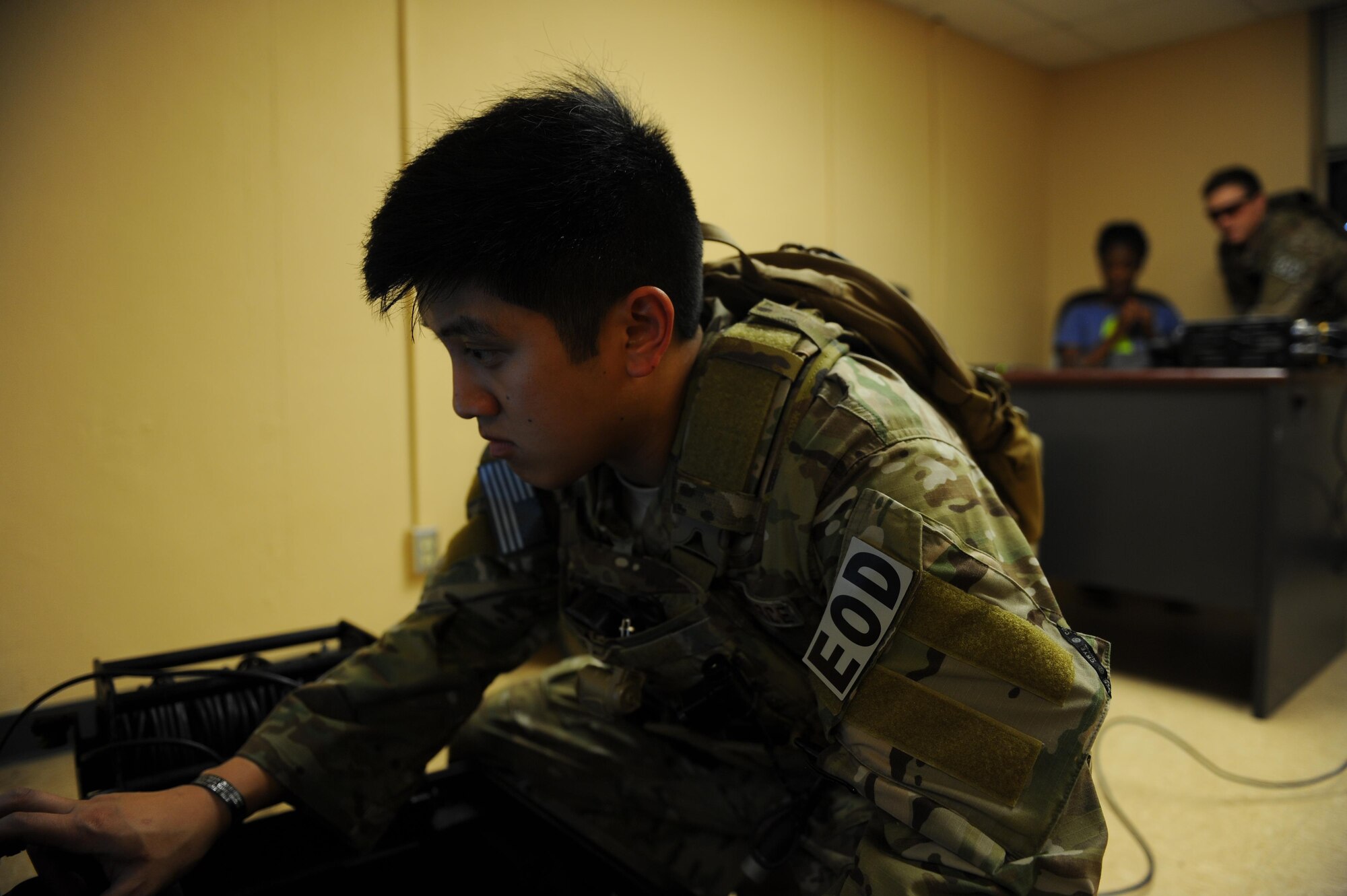 Staff Sgt. Paoloarnold Pineda, an explosive ordnance disposal craftsman with the 1st Special Operations Civil Engineering Squadron, operates an X-Ray machine to investigate what type of bomb is attached to the hostage during an exercise at Hurlburt Field, Fla., June 21, 2017. The exercise placed EOD technicians through a real-world scenario to test their abilities in disarming bombs and maintain global readiness. (U.S. Air Force photo by Airman 1st Class Isaac O. Guest IV)