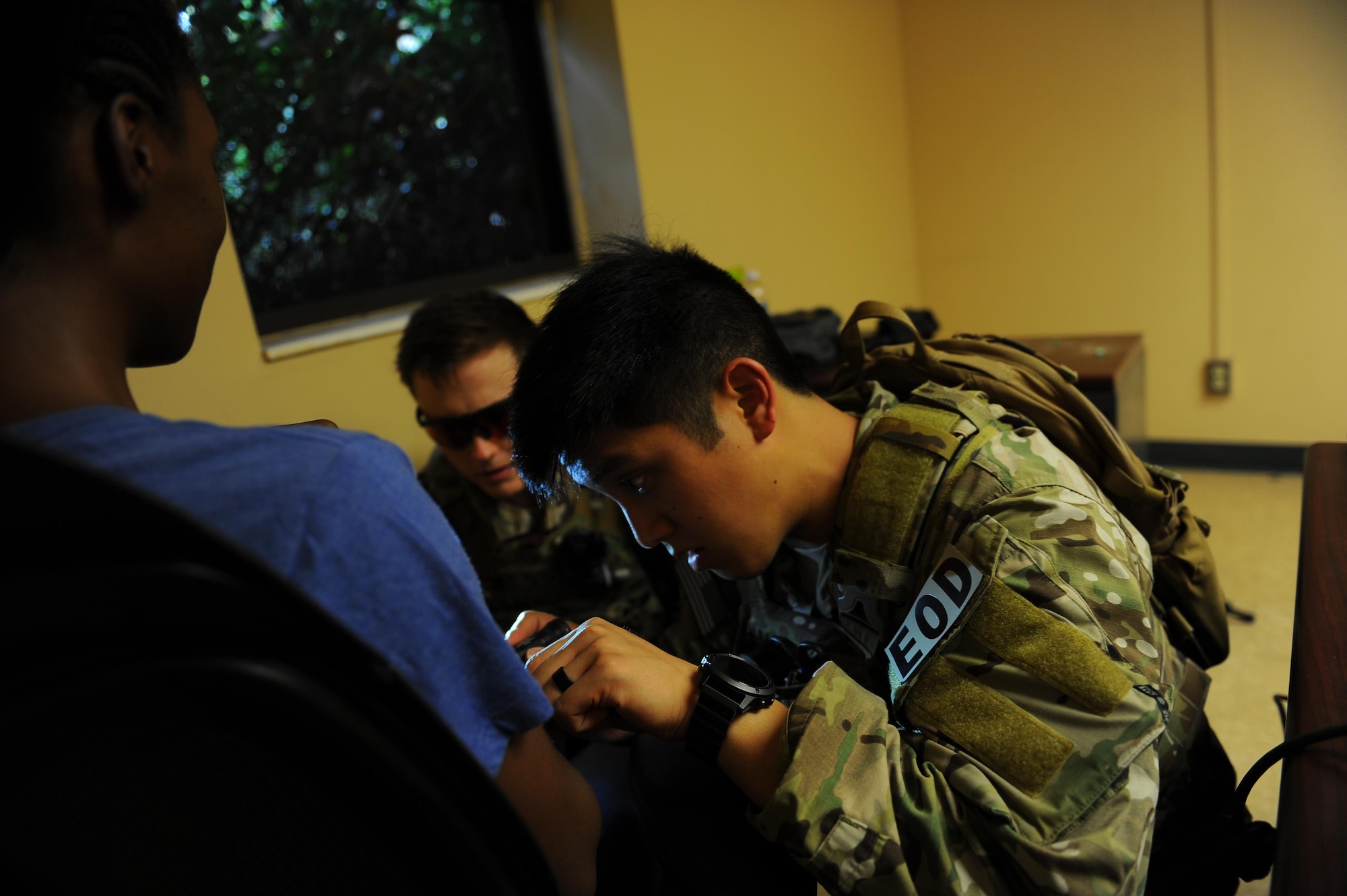 Staff Sgt. Paoloarnold Pineda, right, and Airman 1st Class Lawrence Gress, explosive ordnance disposal technicians with the 1st Special Operations Civil Engineering Squadron, investigate a bomb tied to a hostage during an exercise at Hurlburt Field, Fla., June 21, 2017. EOD technicians are trained to detect, disarm, detonate and dispose of explosive threats as safely as possible. (U.S. Air Force photo by Airman 1st Class Isaac O. Guest IV)