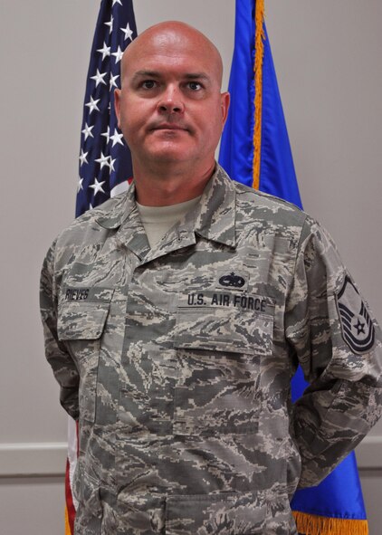 Master Sgt. Michael Rieves is shown shortly after receiving his award as the 919th Special Operations Wing's outstanding Senior NCO of the Quarter (2nd quarter).  Rieves is a C-146 crew chief assigned to the 919th Special Operations Aircraft Maintenance Squadron. (U.S. Air Force photo/Dan Neely)
