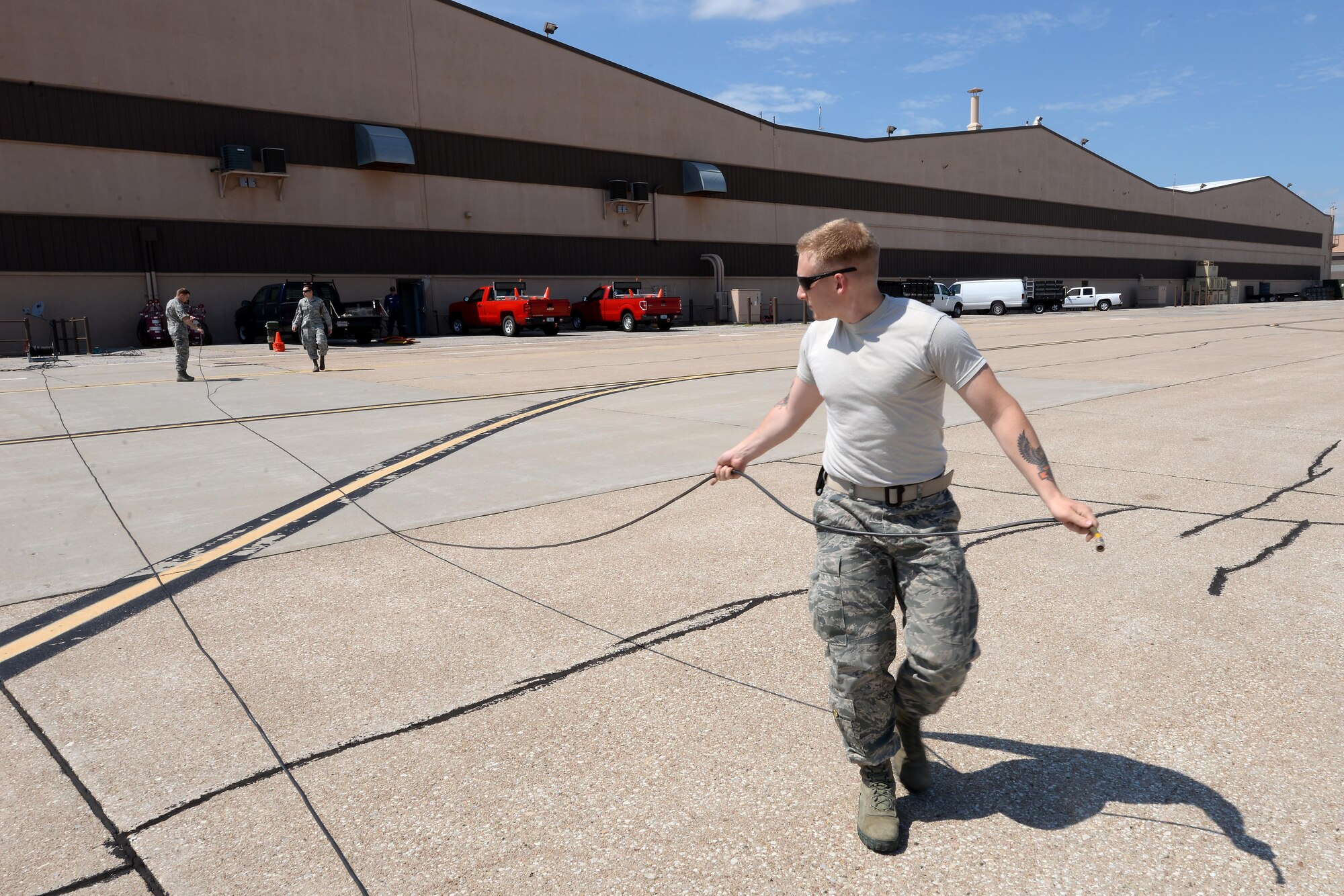 Staff Sgt. Christian Rolland, 55th Strategic Communications Squadron tactical radio technician, sets up a satellite communications terminal while testing communications required for mobile nuclear command and control capabilities at Offutt Air Force Base, Neb. June 27. (U.S. Air Force photo by Delanie Stafford)