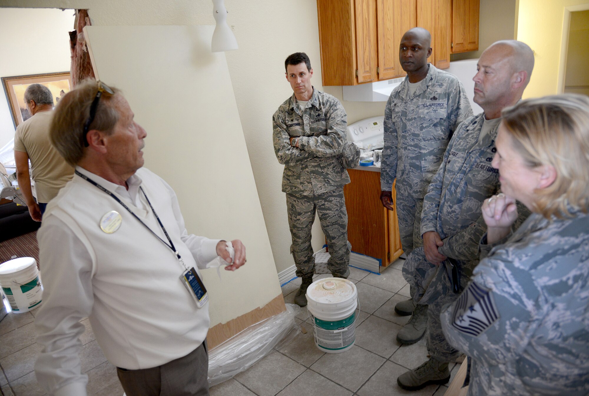 John Seabury, general manager of lodging for the 72nd Force Support Squadron, gives an update on upgrades to the Temporary Lodging Facilities to 72nd Mission Support Group Commander Col. Mark Vitantonio, 72nd Air Base Wing Commander Col. Kenyon Bell, 72nd MSG Vice Commander Lt. Col. Eagle and 72nd ABW Command Chief Master Sgt. Melissa Erb during an immersion tour of several 72nd FSS facilities June 21. The leadership also toured the MPS, Manpower, Honor Guard, CDC South and West, Youth Center, Tinker Club, Airmen and Family Readiness Center, AAFES and Outdoor Rec to gain a better understanding of the general operations, concerns and needs of their facilities. (Air Force photo by Kelly White)