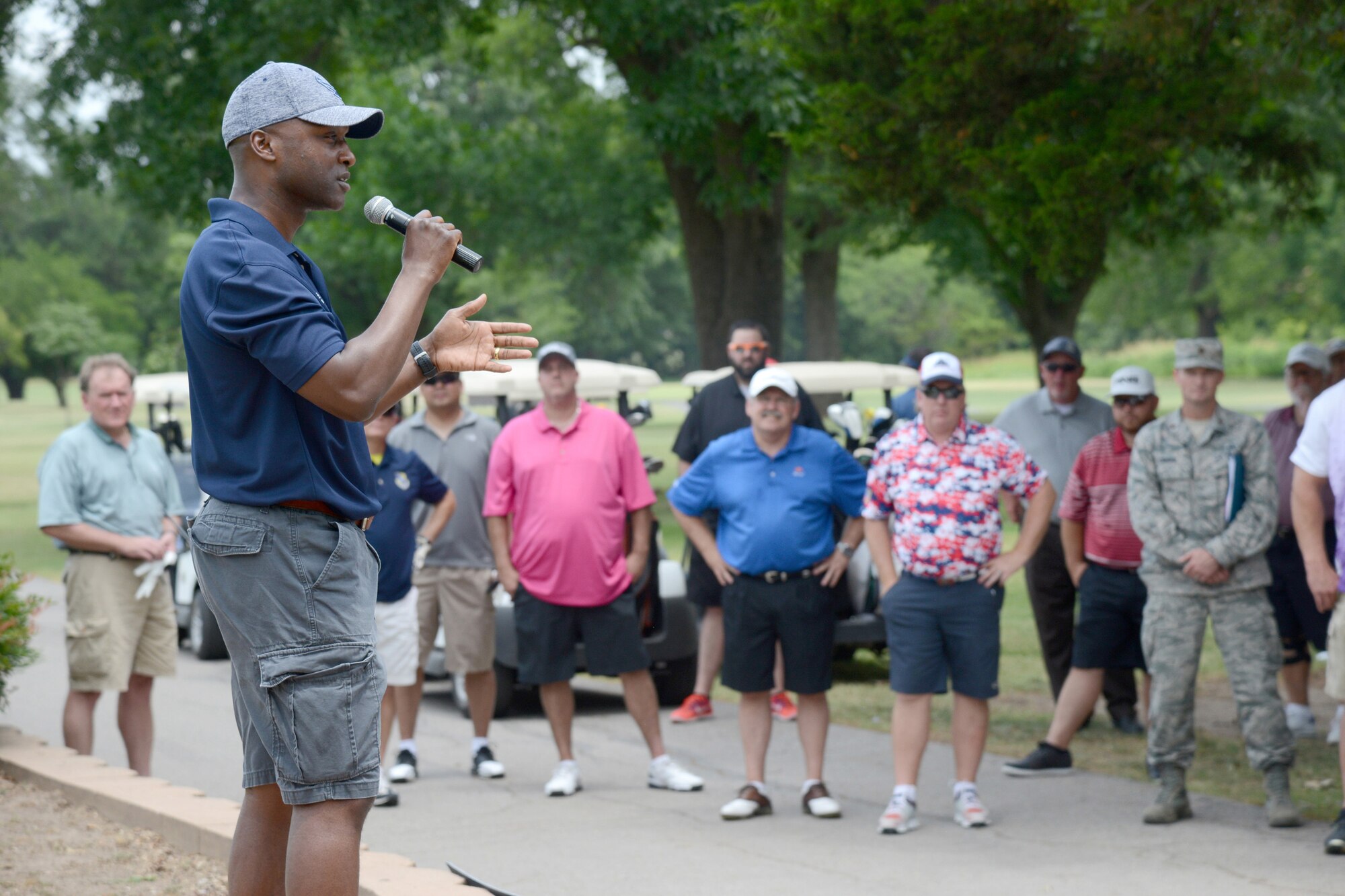 72nd Air Base Wing Commander Col. Kenyon Bell gives remarks and thanks participants during Tinker's 75th Anniversary Golf Tournament June 23.